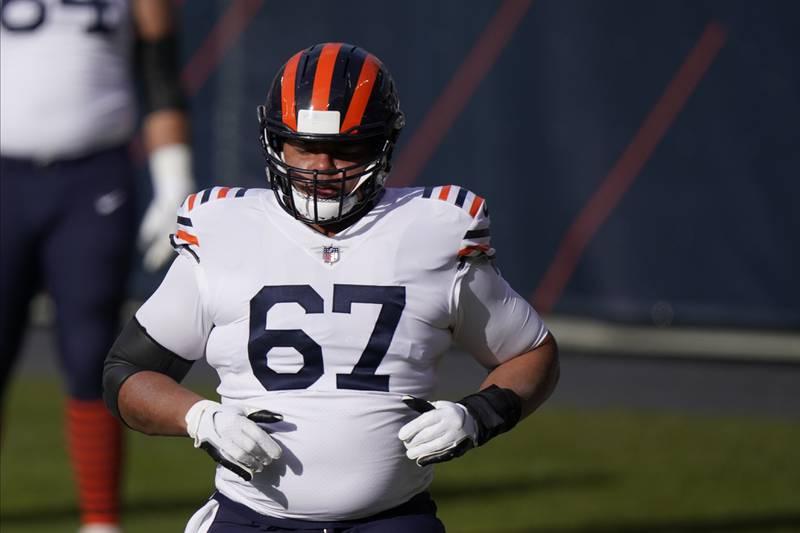 Chicago Bears offensive lineman Sam Mustipher warms up before the Bears' game against the Houston Texans on Sunday, Dec. 13, 2020, in Chicago.