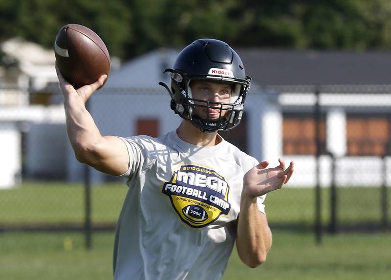 Crystal Lake Central’s Jason Penza throws a pass during football practice Tuesday, July 11, 2023, at Crystal Lake Central High School .