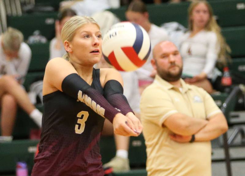 Morris's Emma Geiss returns a serve from L-P on Thursday, Oct. 10, 2024 in A.J. Sellett Gymnasium at L-P High School.
