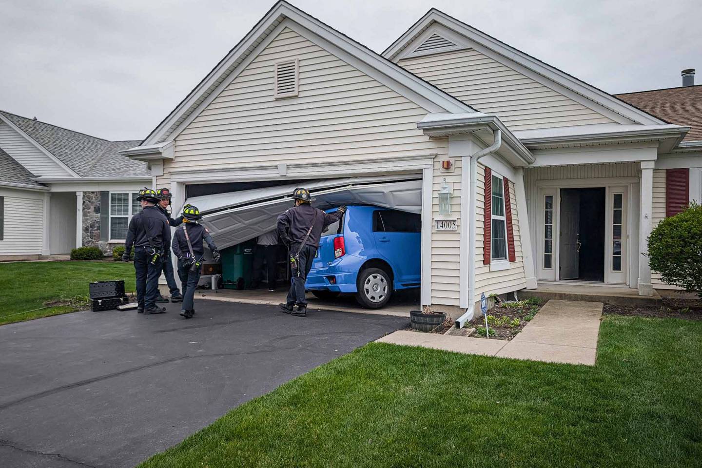 Firefighters transported the driver of a car that collided with a garage to Northwestern Medicine Huntley Hospital with minor injuries following an incident Wednesday, April 30, 2025.