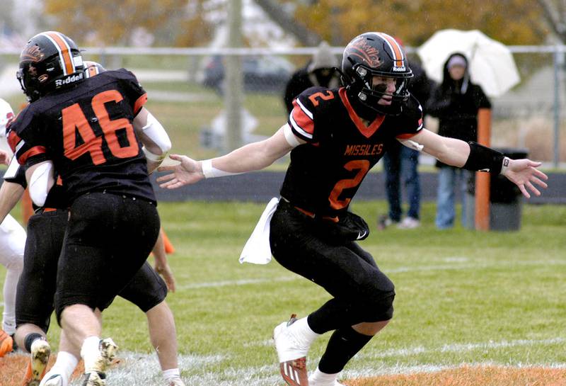 Milledgeville's Kyson Francis hands off to Spencer Nye. The Milledgeville Missiles defeated the South Beloit SoBos 22-6 in Round 2 of the I8FB playoffs. The game took place at Milledgeville on Saturday, November 8th, 2025