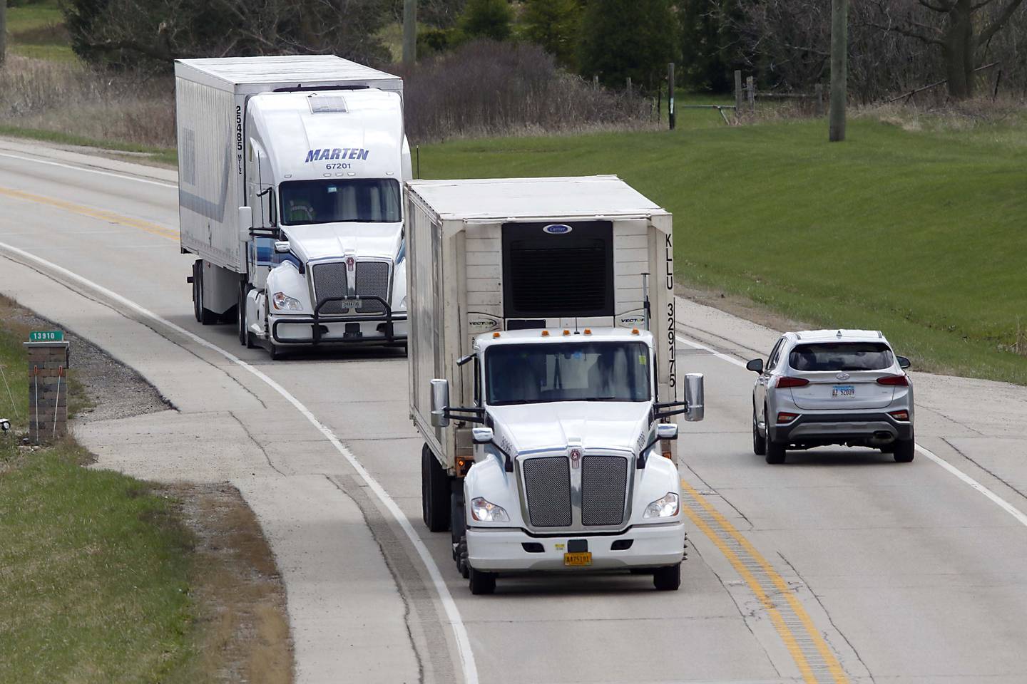 Vehicles travel U.S. Route 14 on Tuesday, April 26, 2022, near West South Street in Woodstock. The Illinois Department of Transportation is resurfacing a nearly six-mile stretch of U.S. Route 14, running west from Hughes and Hartland roads to IL Route 47. The road is a popular route from Woodstock to Harvard and into Wisconsin.