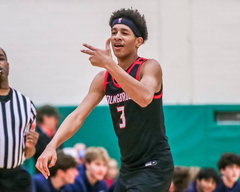 Bolingbrook's Davion Thompson (3) gestures after hitting a three during their Jack Tosh Holiday Classic basketball tournament game between Bolingbrook at Glenbrook South. Friday Dec 27, 2024 in Elmhurst.