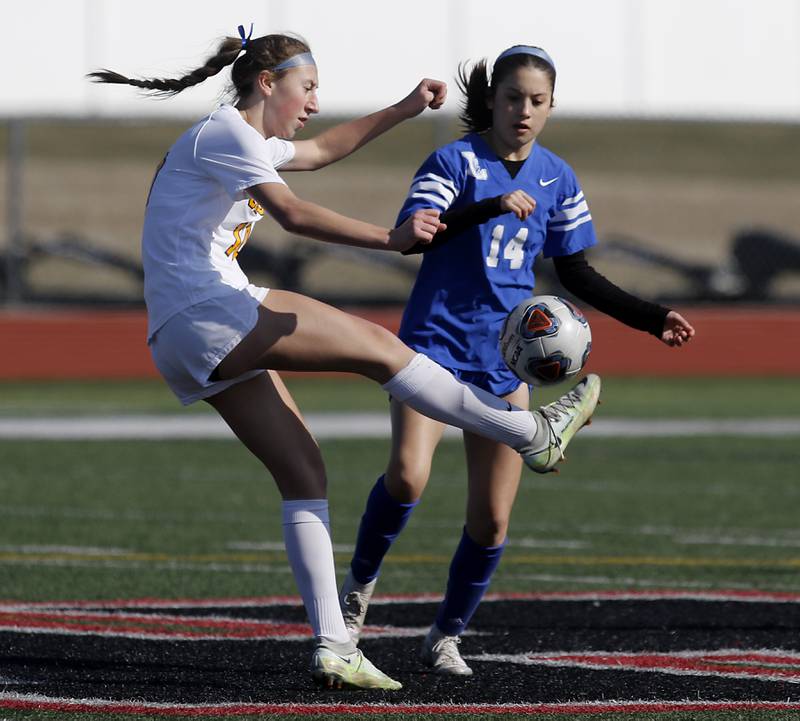 Jacobs' Gabby Wojtarowicz controls the ball in front of Larkin’s Jacqueline Alvarez during a nonconference Huntley Invite girls soccer match Tuesday, March 28, 2023, at Huntley High School.