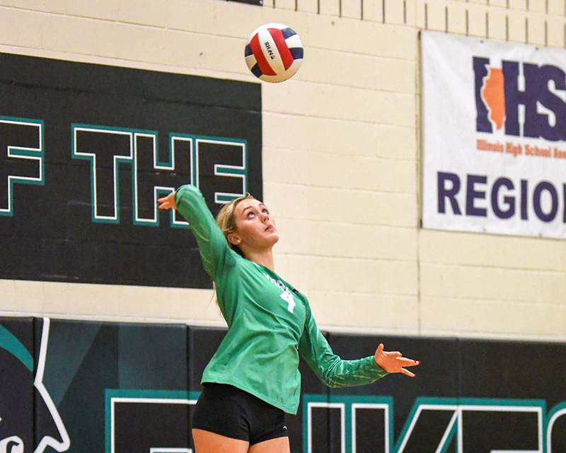 York's Katie Day (4) serves the ball during the regional title game while taking on Lyons Township on Thursday Oct. 30, 2025, held at York High School.