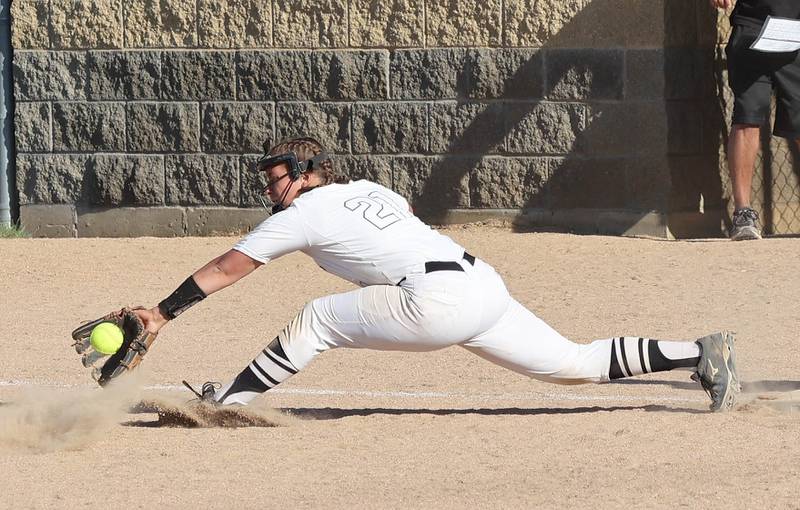 Kaneland's Abby Latka stretches for a throw at first Friday, June 3, 2022, during their IHSA Class 3A Sectional final game against Belvedere North at Sycamore High School.
