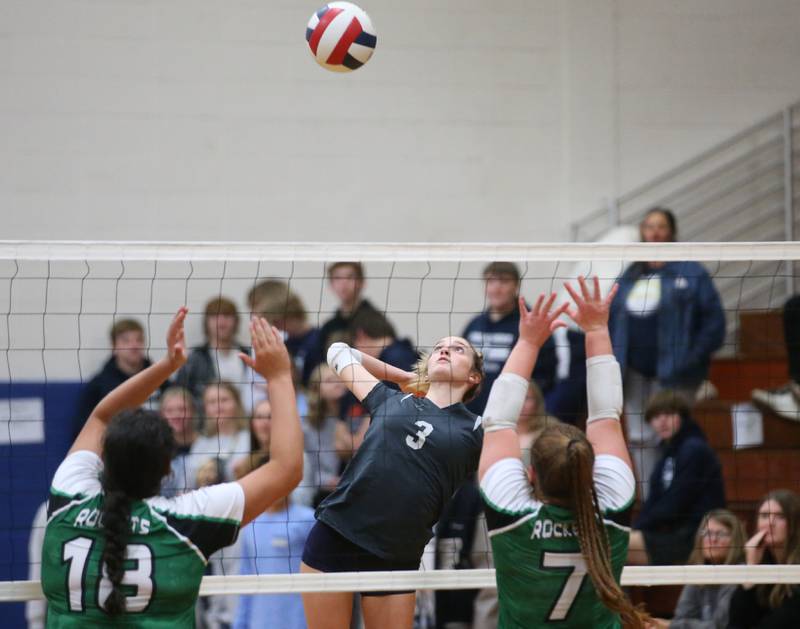 Fieldcrest's Kaitlin White sends a spike between Rock Falls Ari Reyna and Denali Stonitsch in the Class 2A Sectional semifinal game on Monday, Oct. 30, 2023 at Princeton High School.