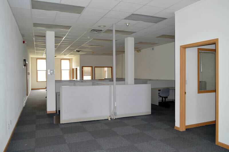 Nine cubicles remain on the second floor of the former Kable News Company building, located on the Mt. Morris campus as of April 20, 2023. Around 90 cubicles used to be spread across the historic building's four floors — including the attic. John Russell, of rural Mt. Morris, closed on his purchase of the building on March 1; he plans to restore and modify it into multi-use space that benefits the community.