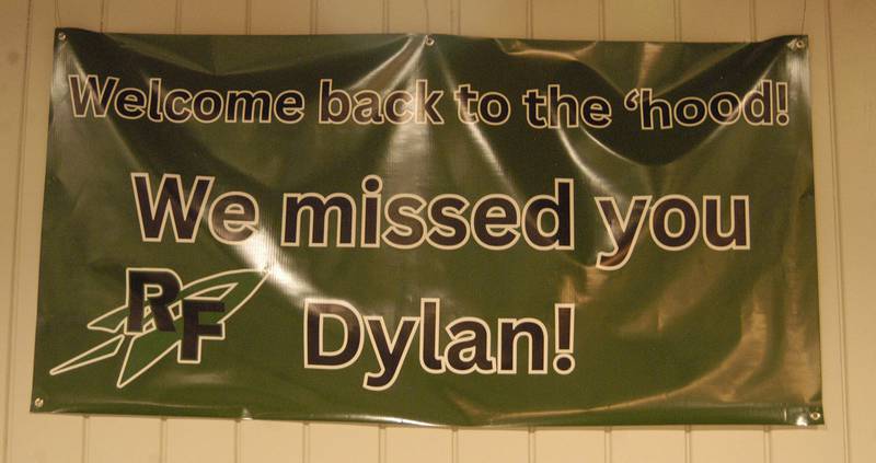 A sign on the wall greets Dylan Wescott at his Welcome Home Party at Emerson's Pub in Rock Falls on Saturday, Nov. 22.