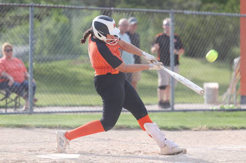 Minooka’s Jaelle Hamilton blasts a shot for for a three run home run against Normal in the Class 4A sectional semifinal on Tuesday, May 21, 2024 in Minooka.