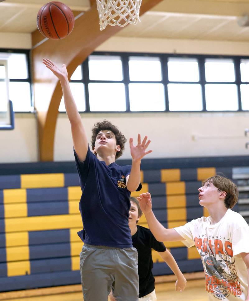 Hiawatha’s Jackson Davenport goes up for a shot during practice Thursday, June 13, 2024 at the school in Kirkland.