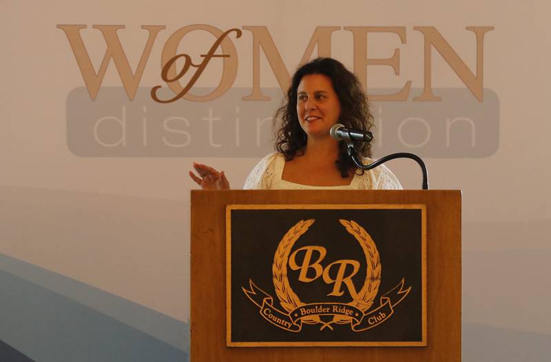 Award recipient Denise Smith speaks during the Northwest Herald's Women of Distinction award luncheon Wednesday June 4, 2025, at Boulder Ridge Country Club, in Lake in the Hills. The luncheon recognized ten women in the community as Women of Distinction.