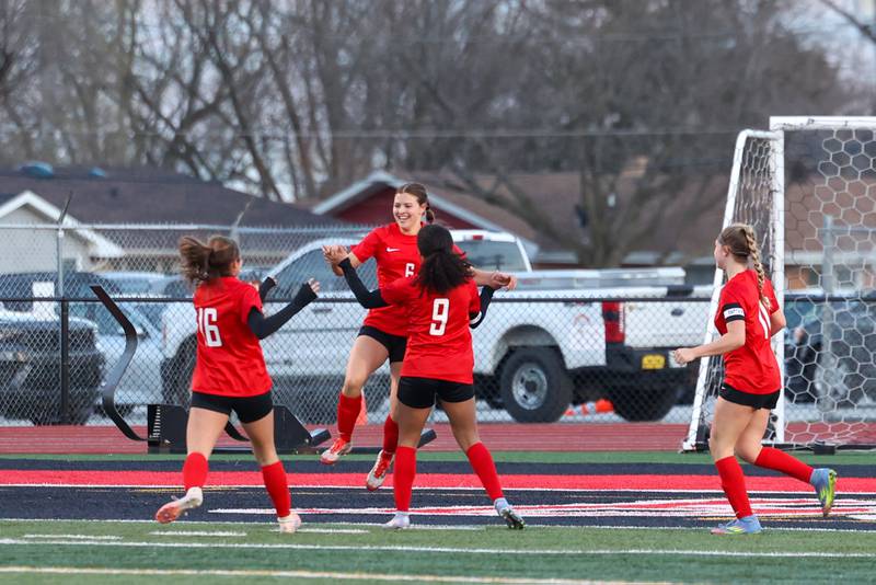 Bradley-Bourbonnais' Lilly Argyelan leaps in celebration of her goal with teammates during the Boilermakers' 4-3 victory over Herscher on Monday, April 6, 2026.