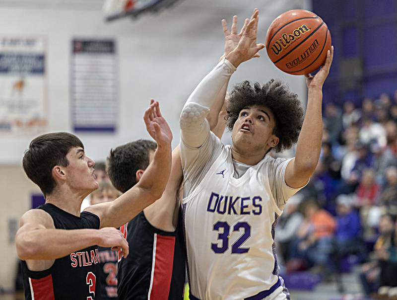 Dixon’s Darius Harrington works below the basket against Stillman Valley Thursday, Dec. 14, 2023 at Dixon High School.