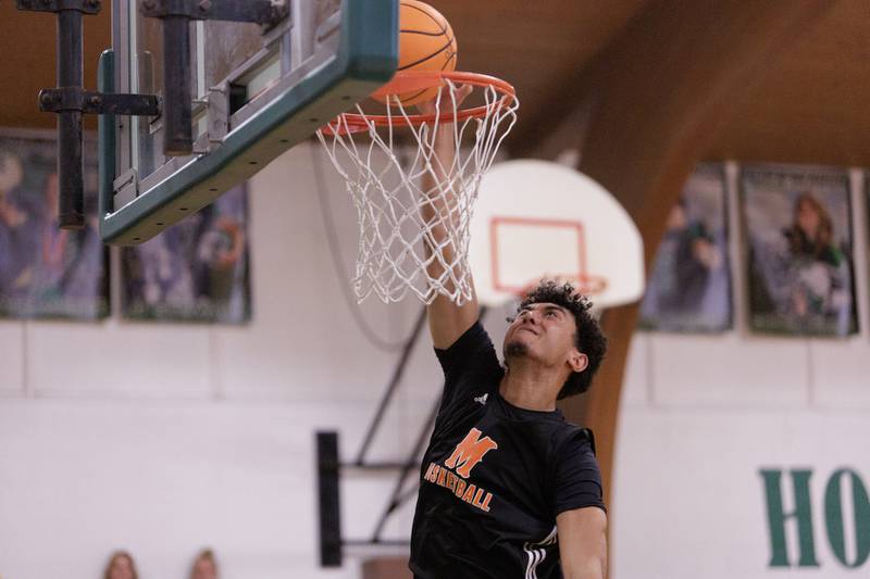 McHenry's Adam Anwar competes in the Dunk contest at the McHenry County Area All-Star Basketball Extravaganza on Sunday, April 12, 2026, at Alden-Hebron.