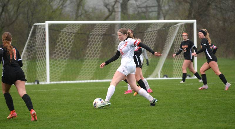 Oregon's Deborah Schmid (3) looks for an opening against Byron on Thursday, April 18, 2024 at Byron High School. The Tigers won the game 2-1.