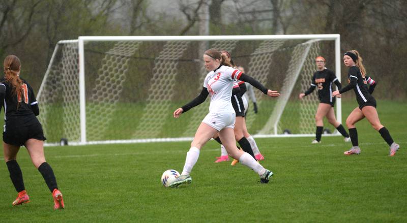 Oregon's Deborah Schmid (3) looks for an opening against Byron on Thursday, April 18, 2024 at Byron High School. The Tigers won the game 2-1.