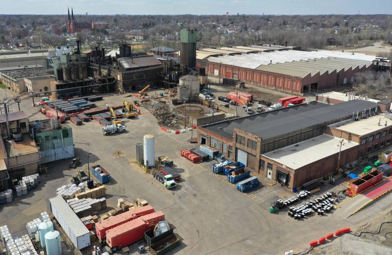 Dozens of garbage dumpsters remain at the site along with excavators as crews continue to clean the area of destruction from the chemical fire three-months later at Carus Chemical on Tuesday, April 11, 2023 in La Salle.