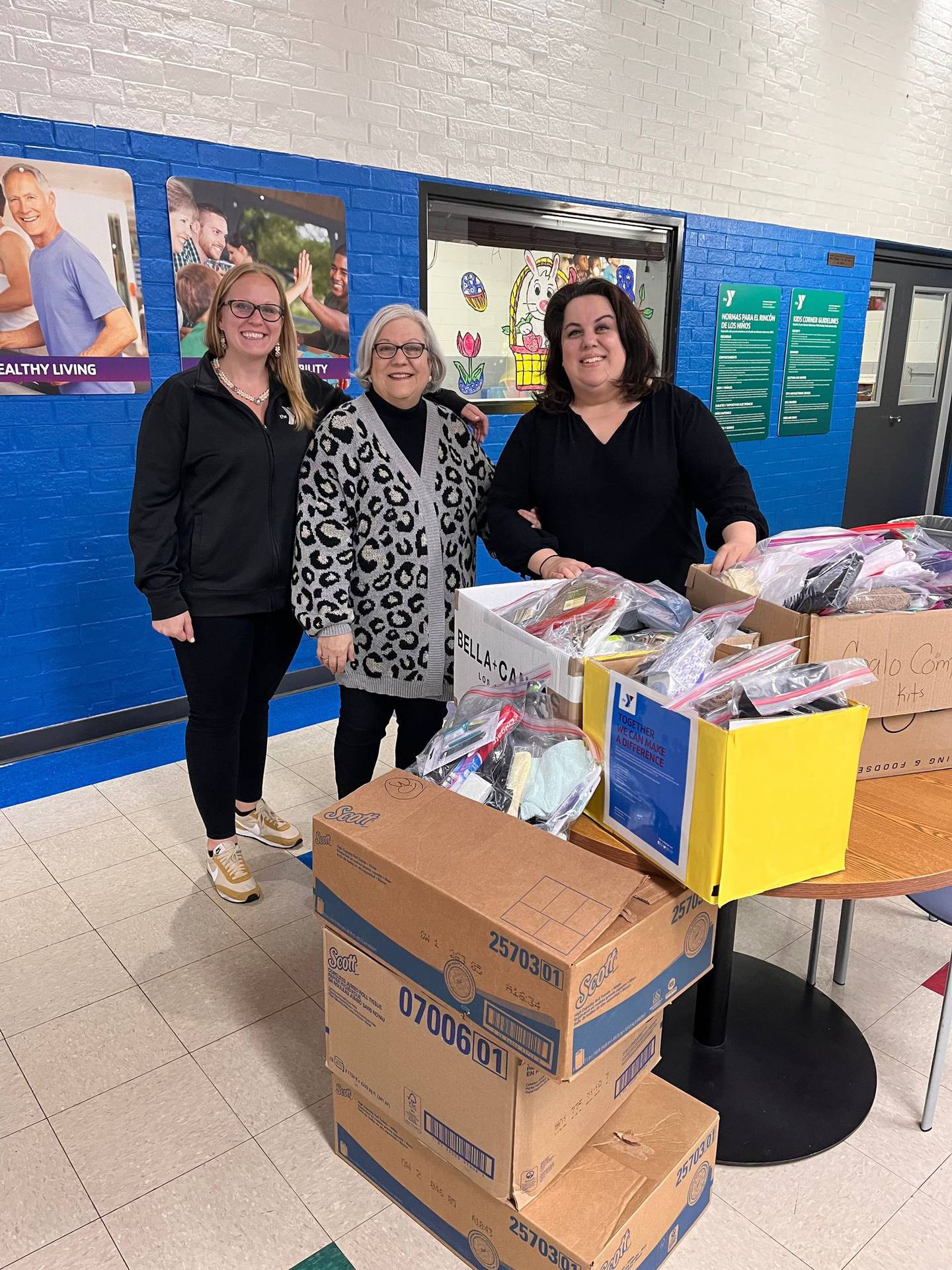 Pictured, from left, are Katy Leclair, president and CEO of the Greater Joliet Area YMCA; Kathy Macris, president of the Philoptochos Society of All Saints Greek Orthodox Church; and Maria Macris, chairperson of the All Saints hygiene kit collection drive within the Joliet Community.