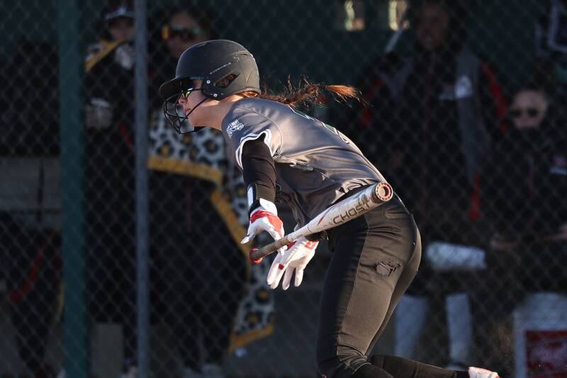 Plainfield Central’s Ava Sommerfeld drives in a run against Bolingbrook on Wednesday, March 20, 2024.
