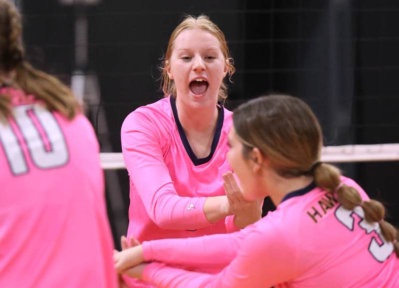 Hiawatha players celebrate a point during their match Tuesday, Oct. 15, 2024, at Indian Creek High School in Shabbona.