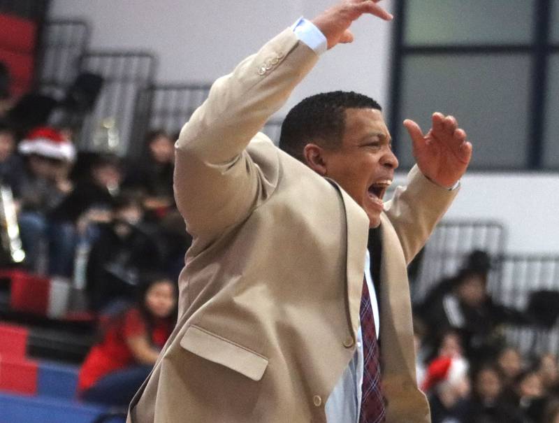 Dundee-Crown’s Head Coach Chuck Fed guides the Chargers against Jacobs in varsity girls basketball on Friday, Dec. 12, 2025, at Dundee-Crown High School in Carpentersville.