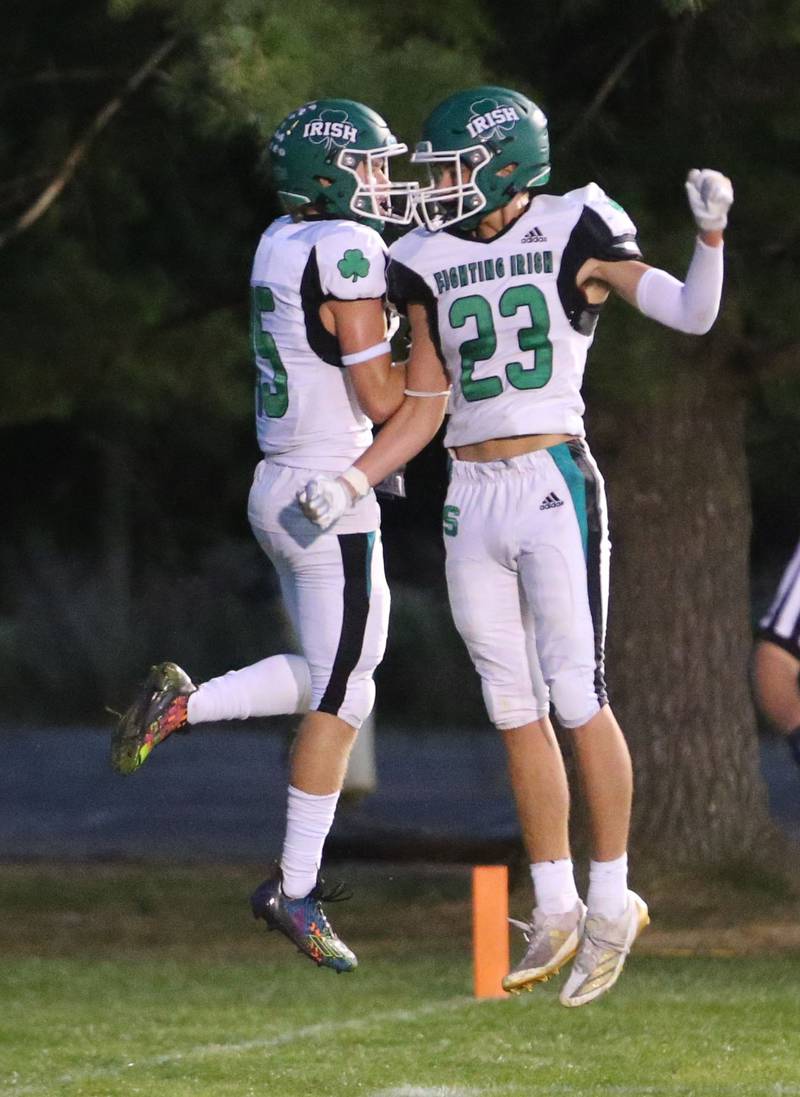 Seneca's Paxton Giertz and teammate Brady Sheedy celebrate after scoring a touchdown against St. Bede on Friday, Sept. 20, 2024 at St. Bede Academy.