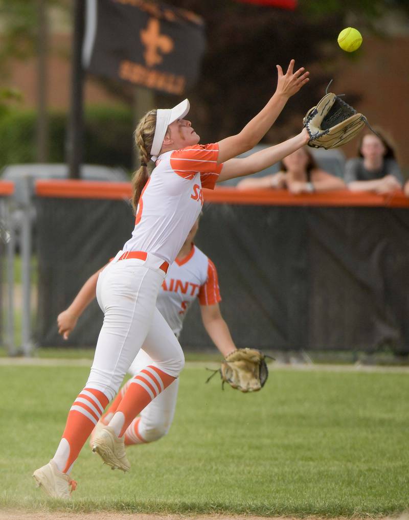 St. Charles East's Abby Arend makes a leaping catch for the out to end the inning against Glenbard North during the Class 4A St. Charles East Sectional semifinal on Tuesday, May 31, 2022.