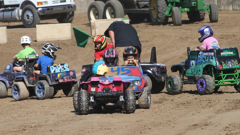 Kids ride Power Wheels during the Kids Demo Derby at the 170th annual Bureau County Fair on Saturday, Aug. 23, 2025 in Princeton.