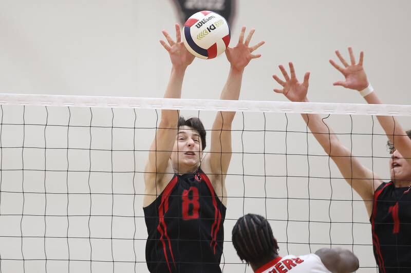 Lincoln-Way Central’s Nick Fabian goes for the block against Bolingbrook on Tuesday May 7, 2024 in New Lenox.