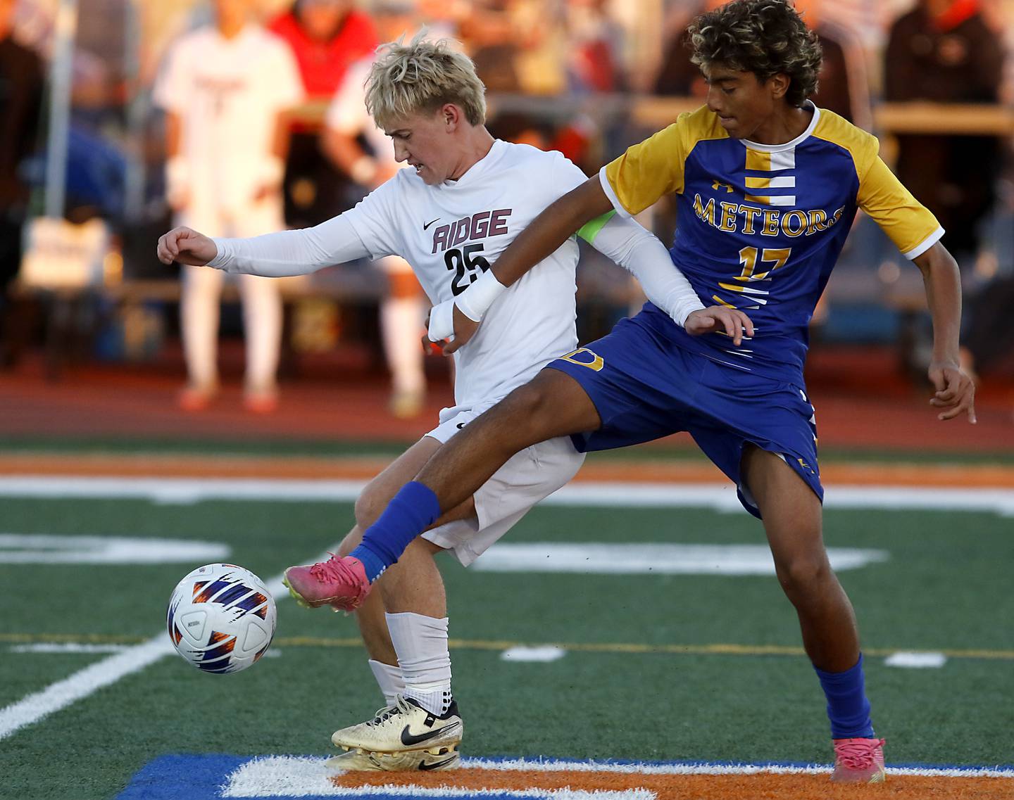 Prairie Ridge's Jensen Schroeder battles with Chicago De La Salle's Christian Flores for control of the ball during an IHSA Class 2A state semifinal soccer match on Friday, Nov. 8, 2024, at Hoffman Estates High School.
