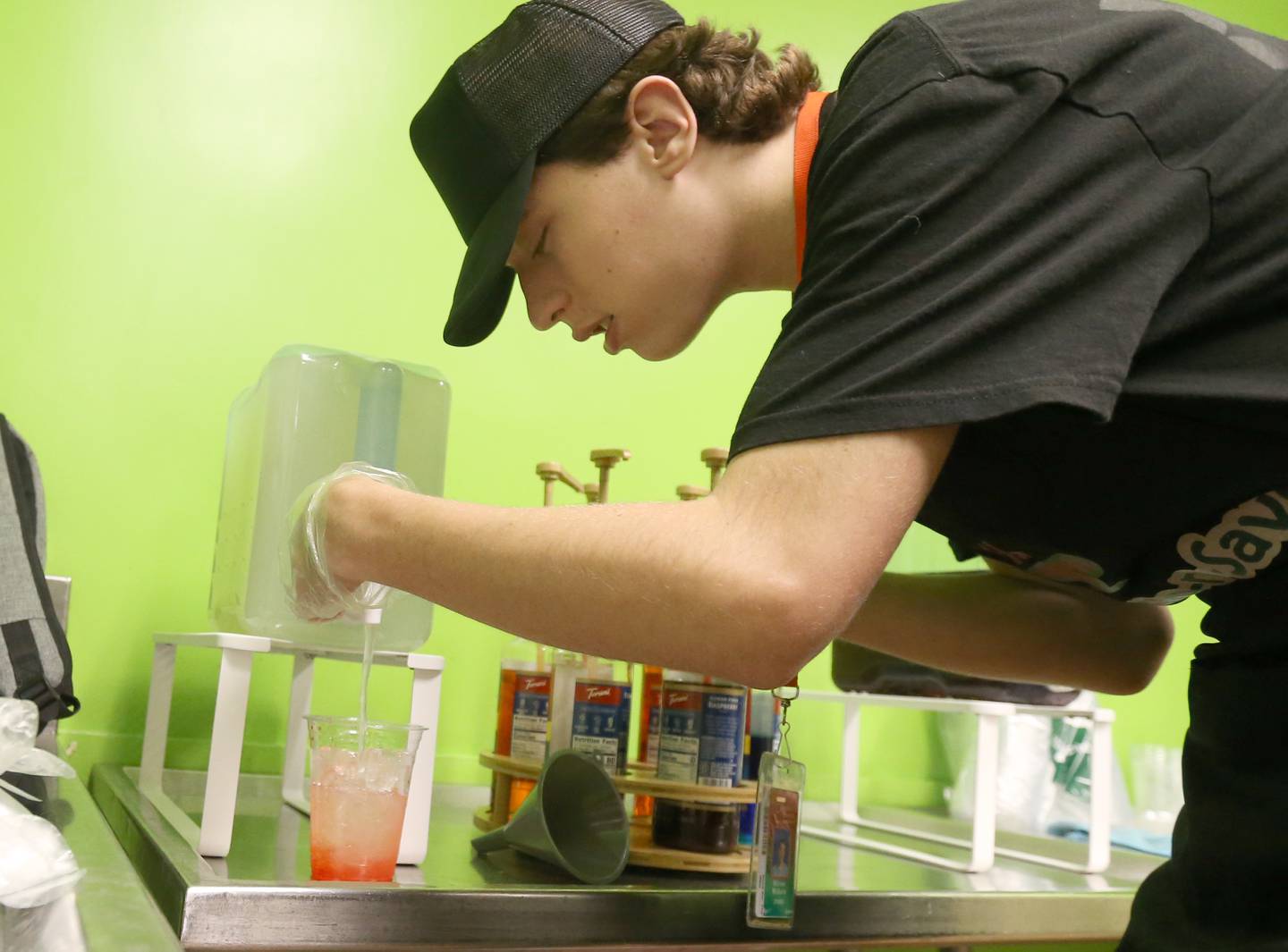 Michael McGuire, a student at La Salle-Peru Township High School, makes a lemonade during the Sim-n-Savor program on Tuesday, Sept. 26, 2023 in the schools cafeteria.