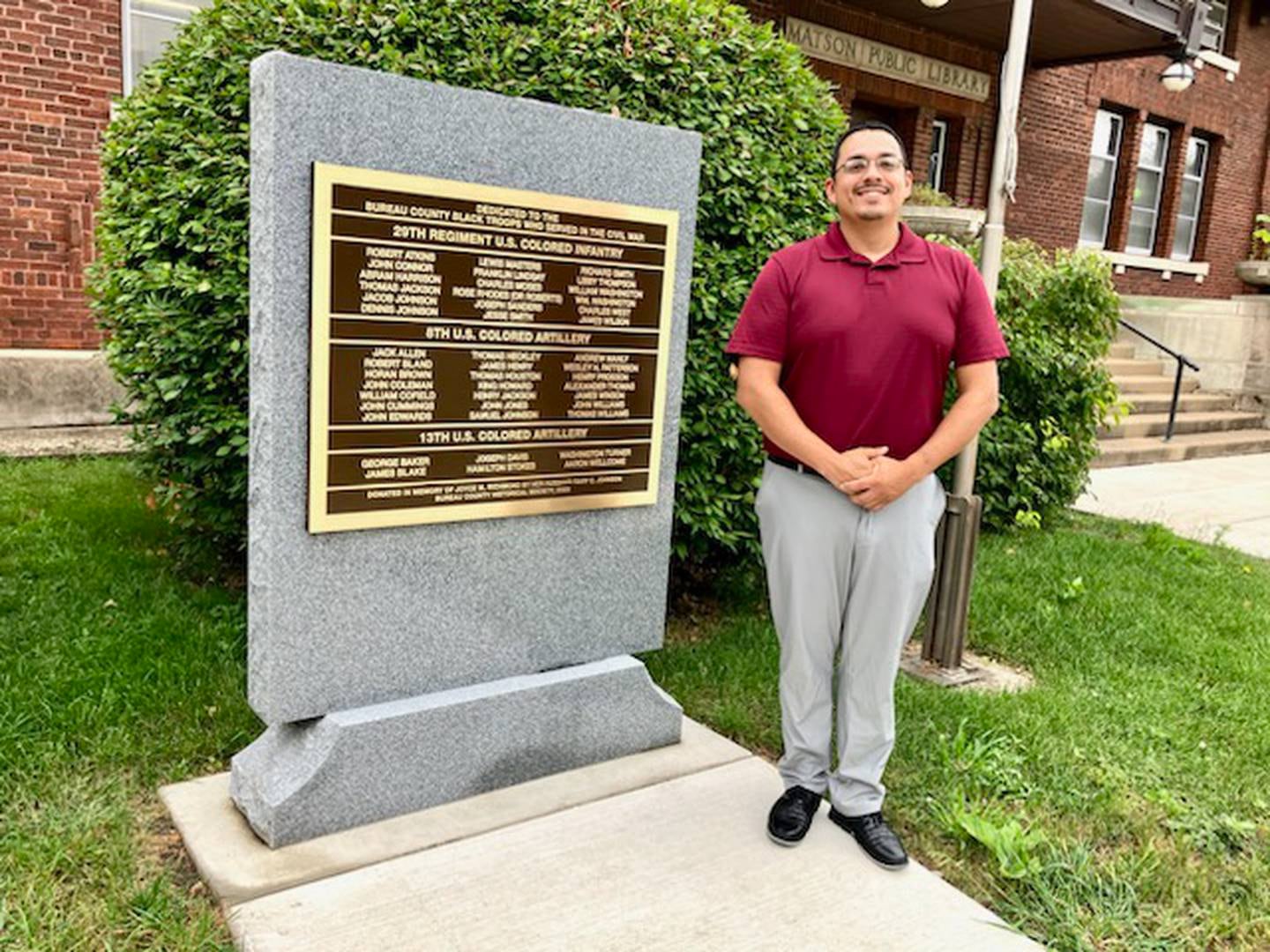 State senate candidate Li Arrelano, a Republican of Dixon, stands Thursday, Aug. 15, 2024, by the Civil War Monument in front of the Sash Stalter Matson Building in Princeton.