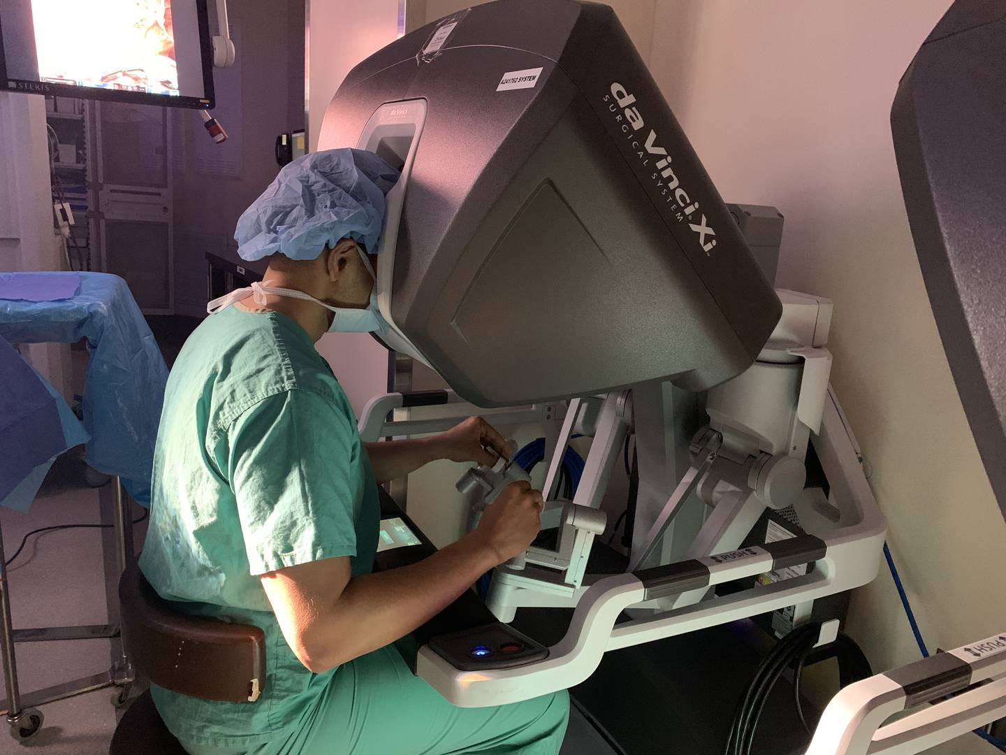 Dr. Ankit Bharat, chief of thoracic surgery at Northwestern Medicine, uses robotic assistance to perform minimally invasive lung cancer surgery at Northwestern Memorial Hospital in Chicago.