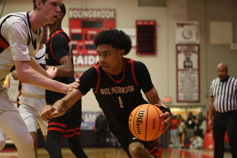 Bolingbrook’s Brady Pettigrew makes a move to the baseline against Benet in the Class 4A Bolingbrook Sectional championship game on Friday, March 6, 2026 in Bolingbrook.
