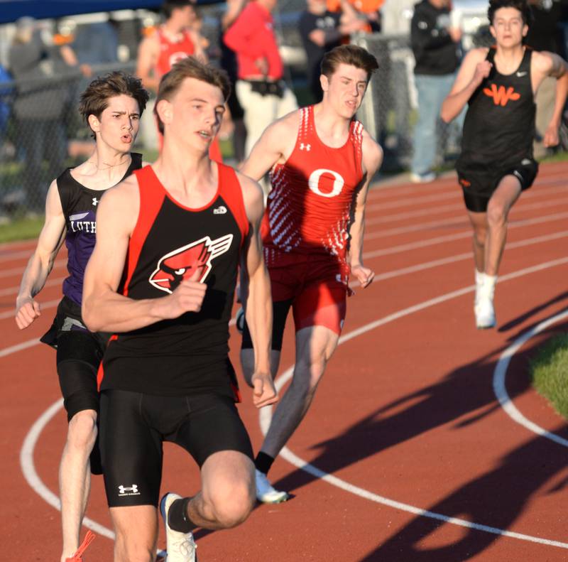 Forreston's Hayden Vinnedge (left) runs the first curve of the 400 meters at the 1A Oregon Sectional at Landers-Loomis Field on Friday, May 23, 2025. He won the race and advanced to the state meet at Eastern Illinois University on Thursday, May 29.