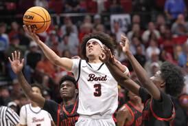 Benet, led by Jayden Wright’s magnificent floor game, blows past Rockford Auburn to head back to state
