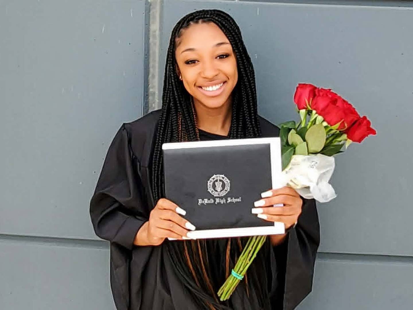 Sariyah Watson, of DeKalb, holds her graduation diploma after the DeKalb High School Class of 2023 Commencement. Watson, 21, was killed on Sunday, May 10, 2026, in a wrong-way crash on Interstate 88 near Aurora.