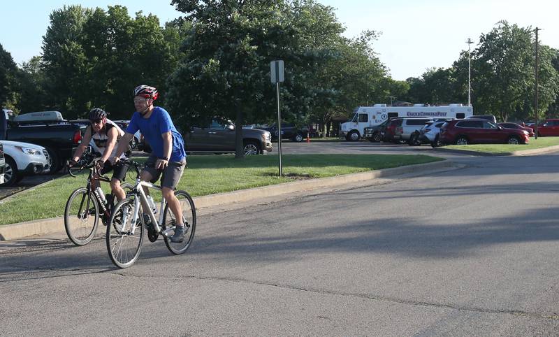 A pair of cyclists leave Zearing Park during the Z Tour event on Saturday June 21, 2025 in Princeton.