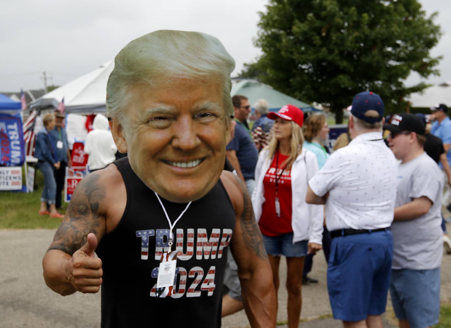 Mike Volpe of St. Charles, gives a thumbs up during the Trump Now-Save the American Dream Rally at the McHenry County Fairgrounds on Sunday Aug. 18, 2024, in Woodstock.