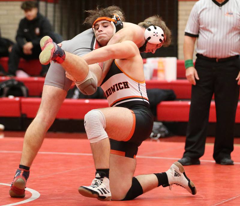 Sandwich's wrestles Ottawa's Tate Spicer in the 182 weight class on Thursday, Jan. 12, 2023 in Kingman Gymnasium at Ottawa High School.