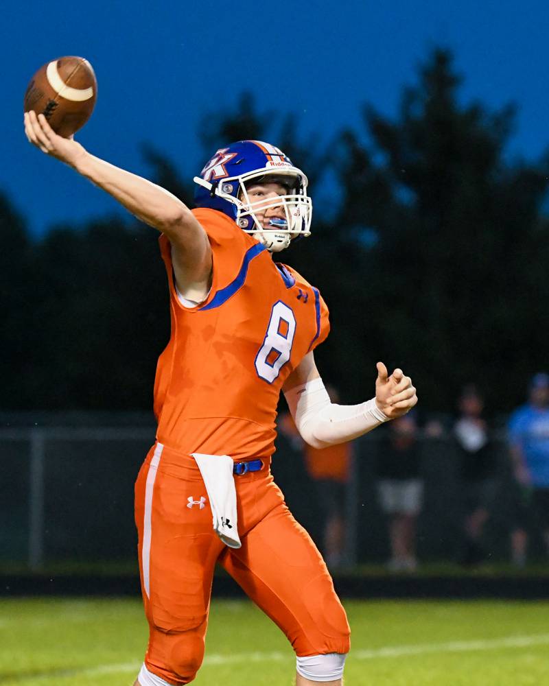 Genoa-Kingston Nathan Kleba (8) tries a pass play in the first quarter Friday Sep. 16th while taking on Byron that turned into an incomplete pass that was played at Genoa-Kingston.