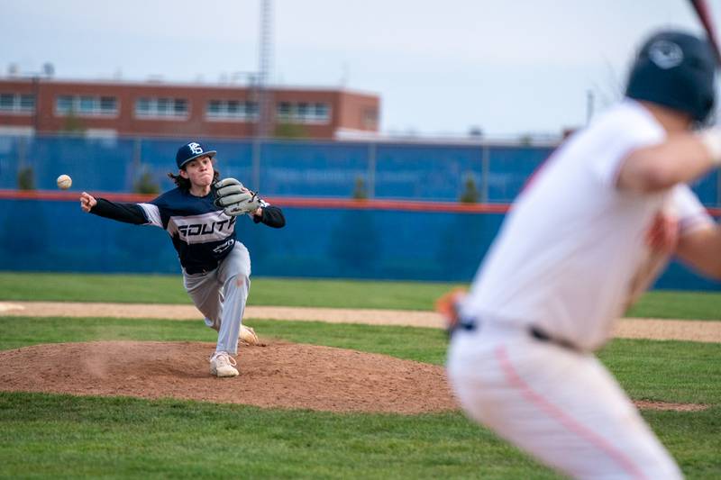 Plainfield South's Jacob Sense (16) delivers a pitch against Oswego during a baseball game at Oswego High School on Monday, April 11, 2022.