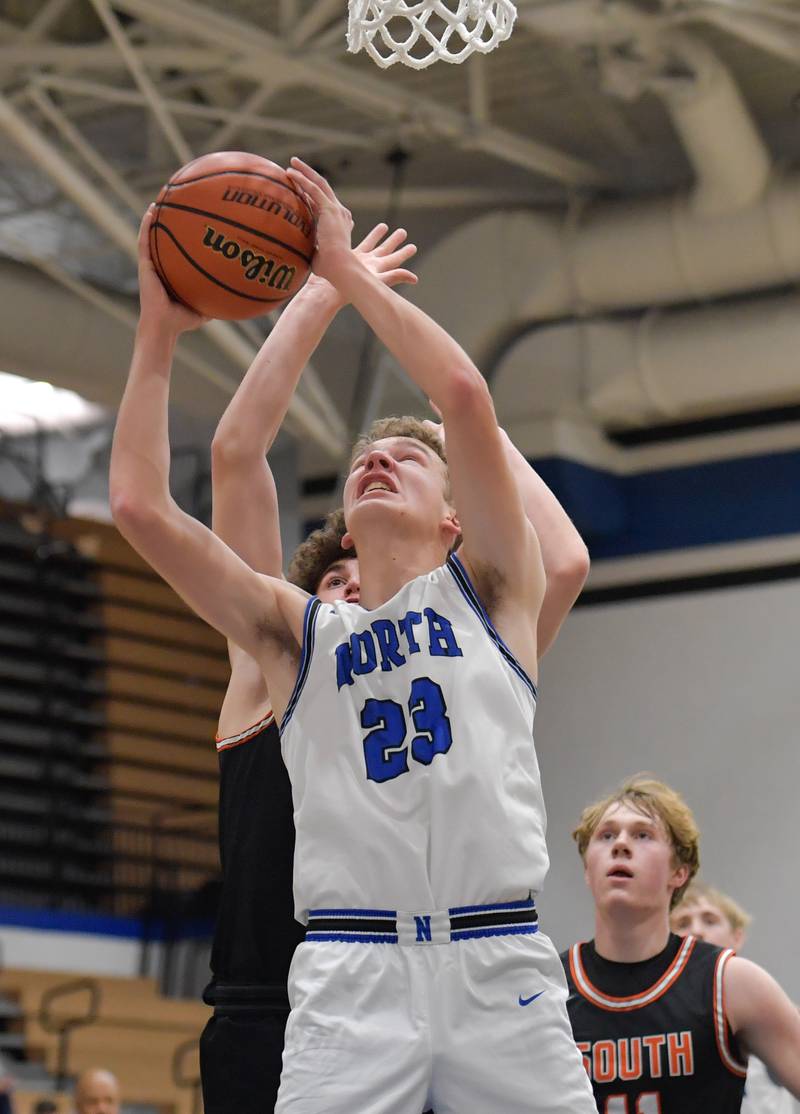 St. Charles North's Luke Holtz (23) works for the shot against during a game on Friday, December 2, 2022.