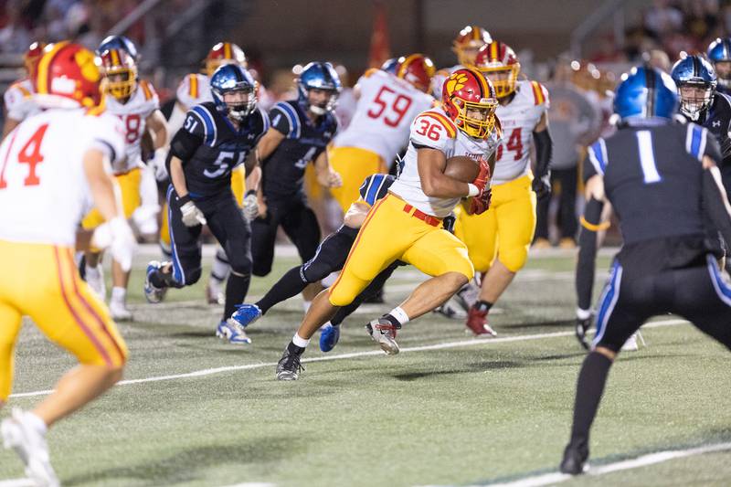 Batavia's Preston Brummel runs the ball against St. Charles North on Friday, Sept. 26, 2025 in St. Charles.