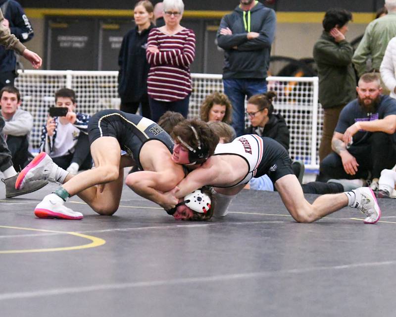 Kamron Scholl, right, of Kaneland High School wrestles Tyler Lochart of Sycamore in the 120 weight class during the 2A sectional meet on Saturday Feb. 10, 2024, held at Sycamore High School.