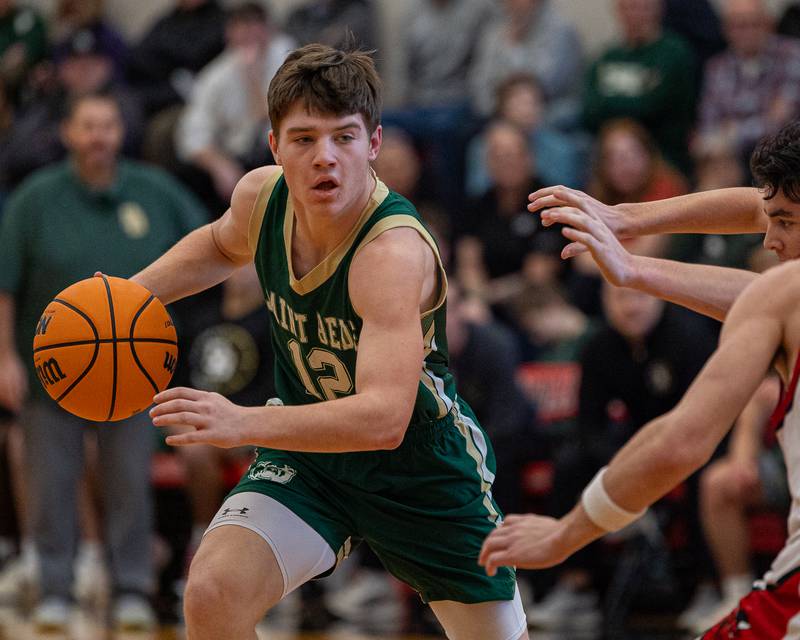 St. Bede's Carson Riva (12) dribbles ball on Saturday, January 31, 2026 at Hall High School in Spring Valley.