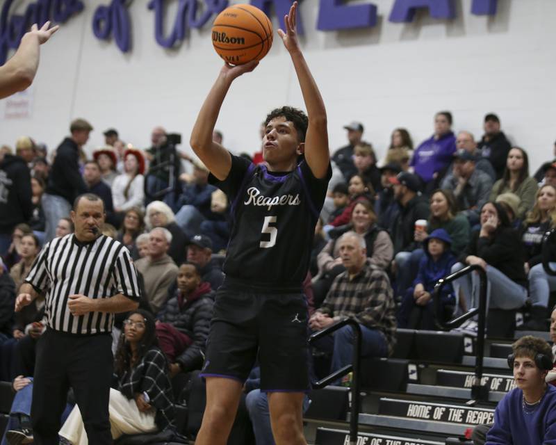 Plano's Eric Nunez (5) shoots a jump shot during their Plano Christmas Classic basketball game between Streator at Plano Friday, Dec 26, 2025 in Plano.