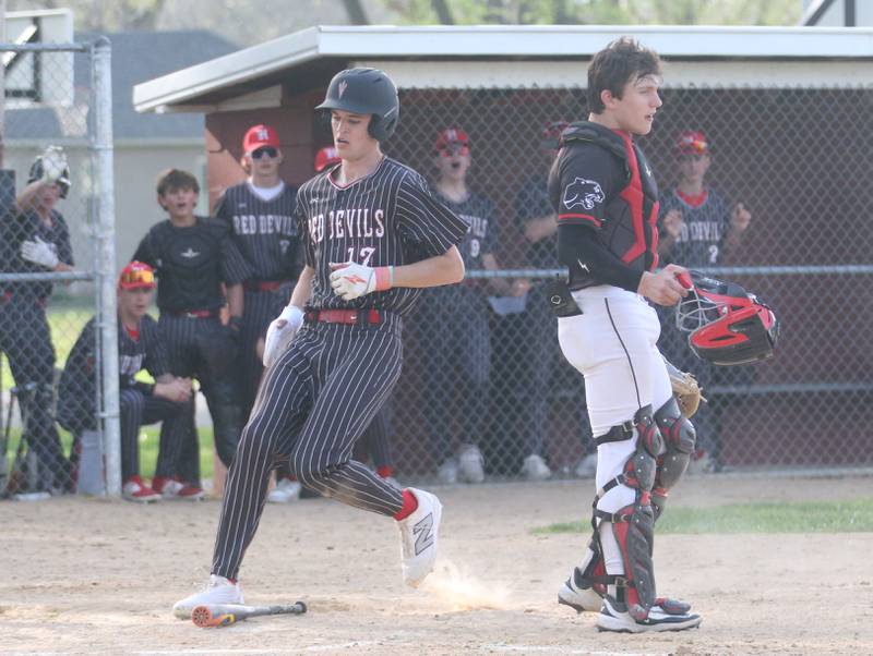 Hall's Clayton Fusinetti crosses home plate as Erie-Prophetstown catcher Parker Rangel waits for the late throw on Monday, April 28, 2025 in Foley Field at Kirby Park in Spring Valley.