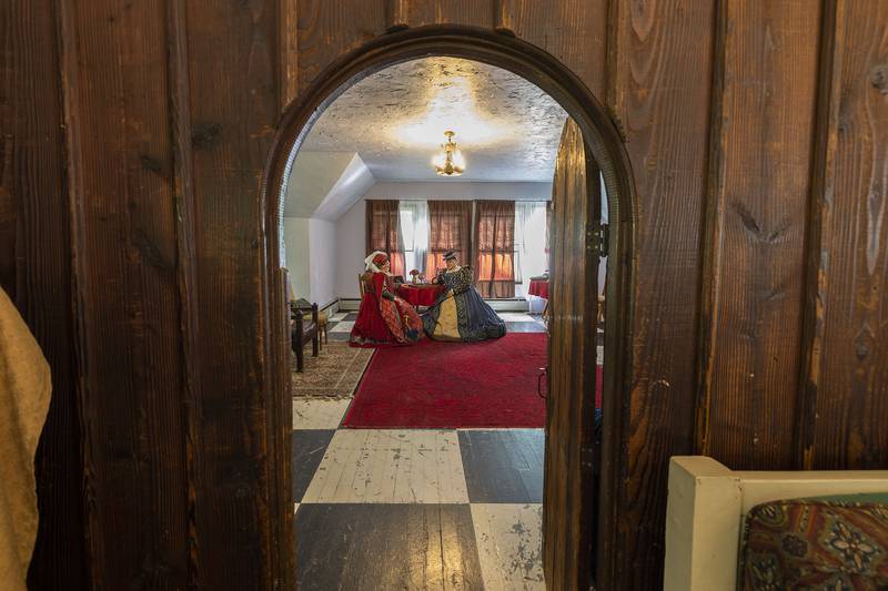 Countess Lennox, aka Margaret Douglas (left) and Countess Lincoln, aka Elisabeth Fitzgerald, play a game of cables Sunday, October 5, 2025, in the parlor of Stronghold. The castle was opened to visitors during the Old English Faire.